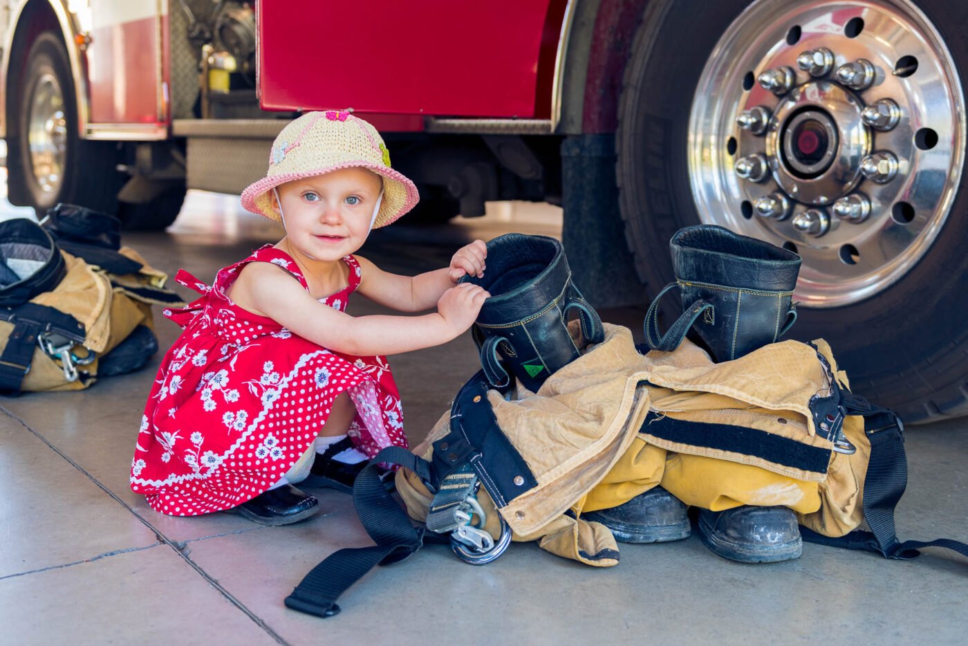 girl-checking-fire-fighter-boots